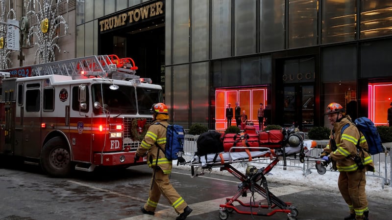 New York Fire Department crew respond after a fire broke out at Trump Tower in Manhattan. Photograph: REUTERS/Andrew Kelly