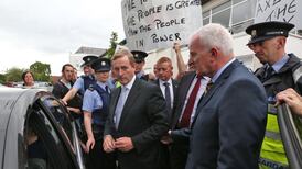 Taoiseach surrounded by protesters at care centre opening
