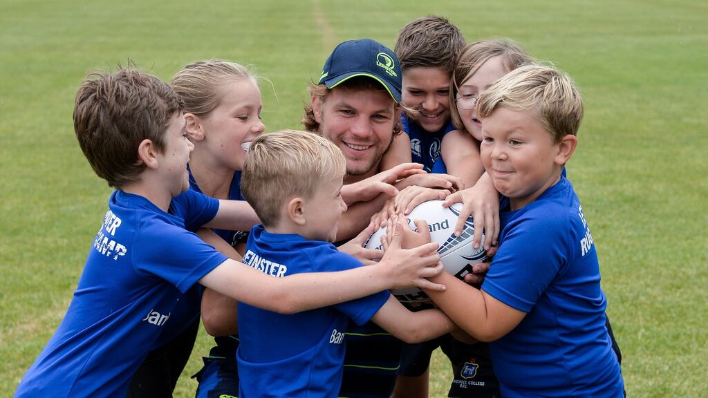 Leinster’s Jordi Murphy with participants at the Leinster Rugby Camp at Blackrock College RFC. Photograph: Piaras Ó Mídheach/Sportsfile
