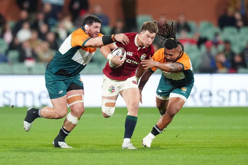 British and Irish Lions' Huw Jones (centre) is tackled by AUNZ Invitational XV's Brandon Paenga-Amosa (right) and Jeffery Toomaga-Allen. Photograph: David Davies/PA