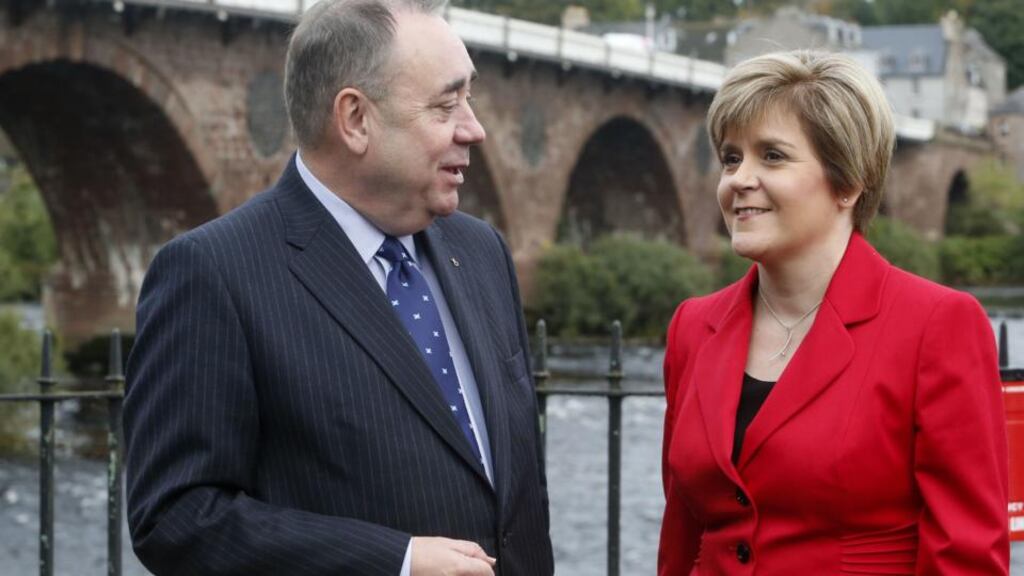 First minister Alex Salmond and deputy first minister Nicola Sturgeon in Perth, Scotland, on the first day of the SNP annual conference. Photograph: Danny Lawson/PA Wire