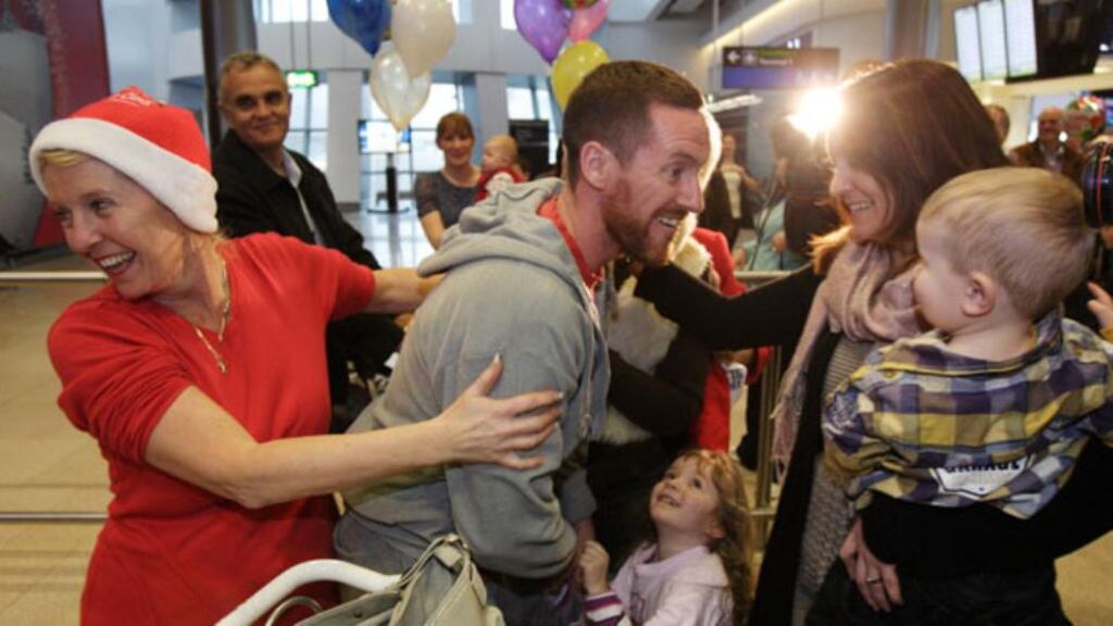 Christmas homecoming scenes at Dublin Airport. Undocumented Irish migrants in the United States have been advised to seek legal advice before travelling home.