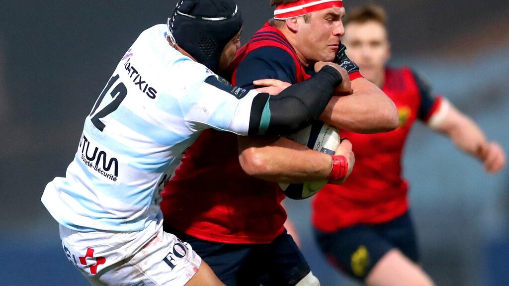 Racing 92’s Anthony Tuitavake and CJ Stander of Munster during the European Rugby Champions Cup Round 1 match at Stade Yves-du-Manoir in Paris on Saturday. Photograph: James Crombie/Inpho