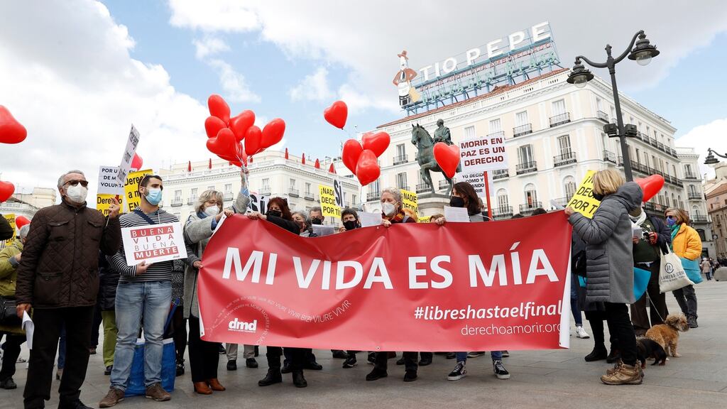 Members of the association Derecho a Morir Dignamente  (Right to die with dignity) rally at the Puerta del Sol in downtown Madrid on Thursday. Photograph:  EPA/Chema Moya