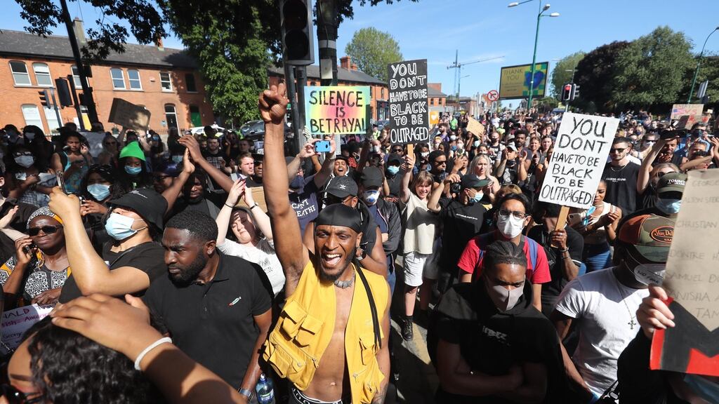 People at a Black Lives Matter protest on Monday outside the US embassy in Dublin following the death of George Floyd in Minneapolis. Photograph: Niall Carson/PA
