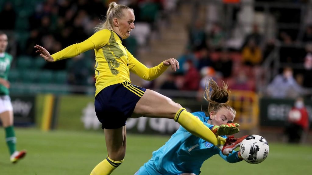 Republic of Ireland goalkeeper Courtney Brosnan blocks an attempt from Sweden’s Stina Blackstenius during the World Cup qualifier at Tallaght Stadium. Photograph: Brian Lawless/PA Wire