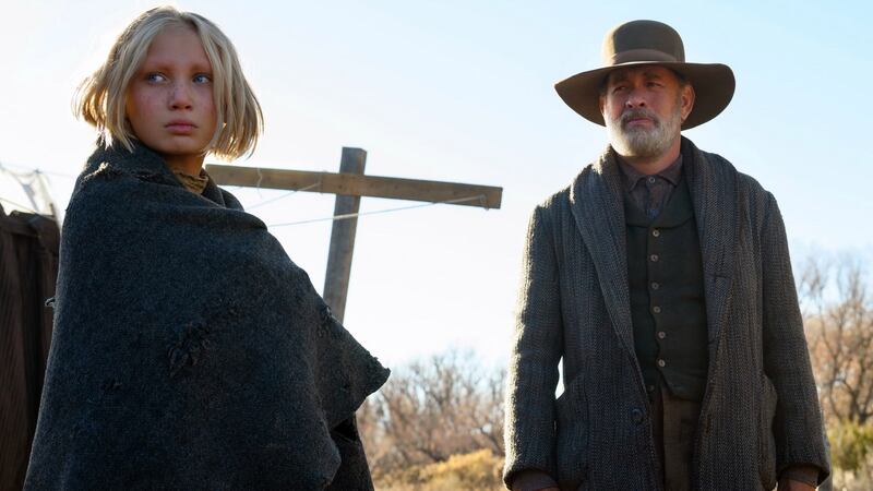 Helena Zengel and Tom Hanks in News of the World (2020), directed by Paul Greengrass. Credit: Bruce W. Talamon/Universal Pictures