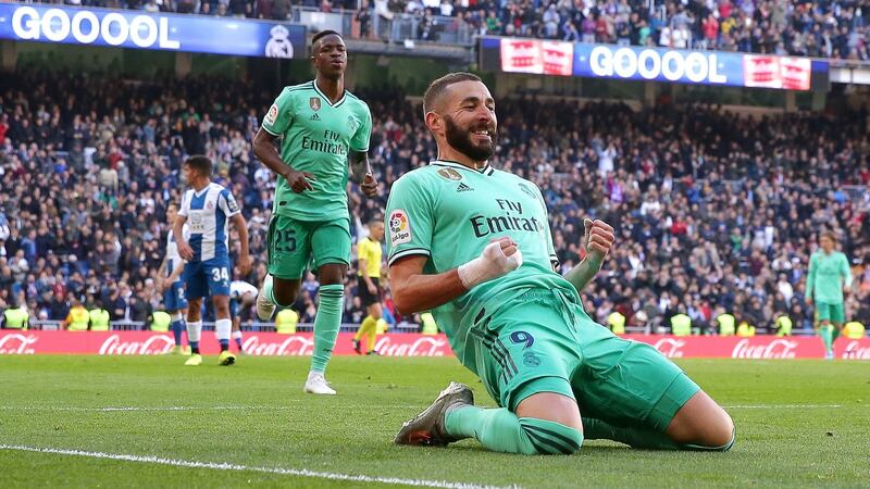 Karim Benzema celebrates scoring Real Madrid’s second against Espanyol. Photograph: Gonzalo Arroyo Moreno/Getty