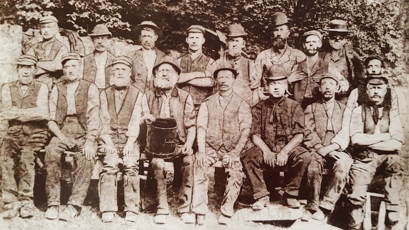 James Flynn, Catherine’s great-grandfather, with a road-building gang in Leeds, c.1890 (James is front row, centre, next to man with tar barrel and white beard)