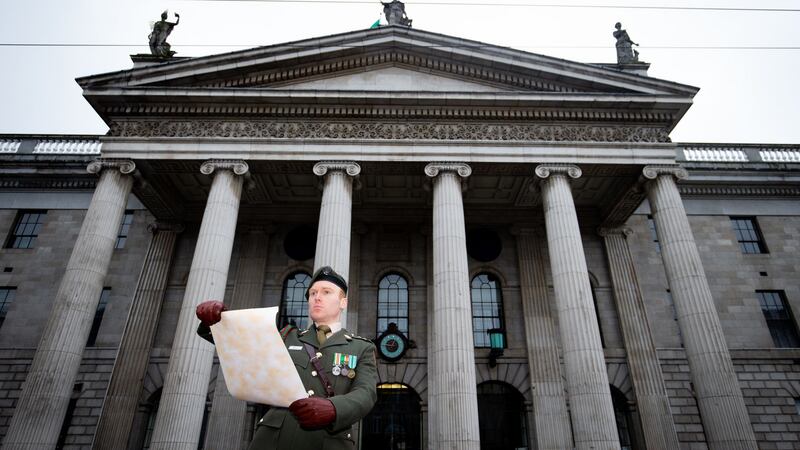 The 1916 proclamation was read by Captain Darren Reilly outside on the GPO on O’Connell Street in Dublin to mark the anniversary of the 1916 Easter Rising. Photograph: Tom Honan/The Irish Times.