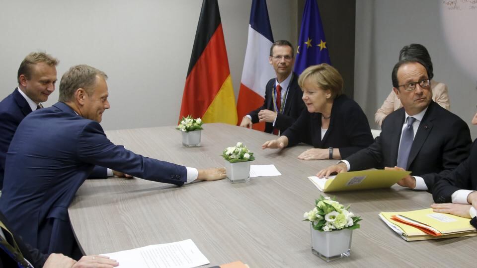 European Council President Donald Tusk, German Chancellor Angela Merkel and French President Francois Hollande take part in a euro zone EU leaders emergency summit on the situation in Greece, in Brussels. Photograph: Olivier Hoslet/Reuters