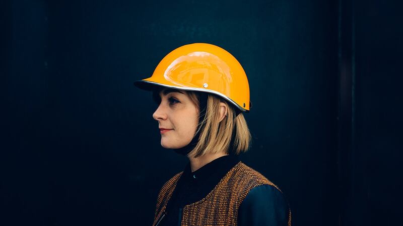 The Dashel helmet in orange, by Catherine Bedford.