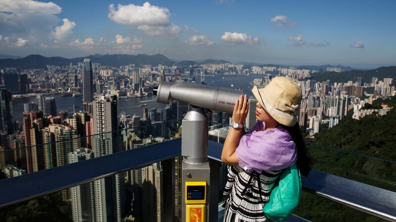 On a sunny day, you can see for miles from the Peak. Photograph: Getty Images