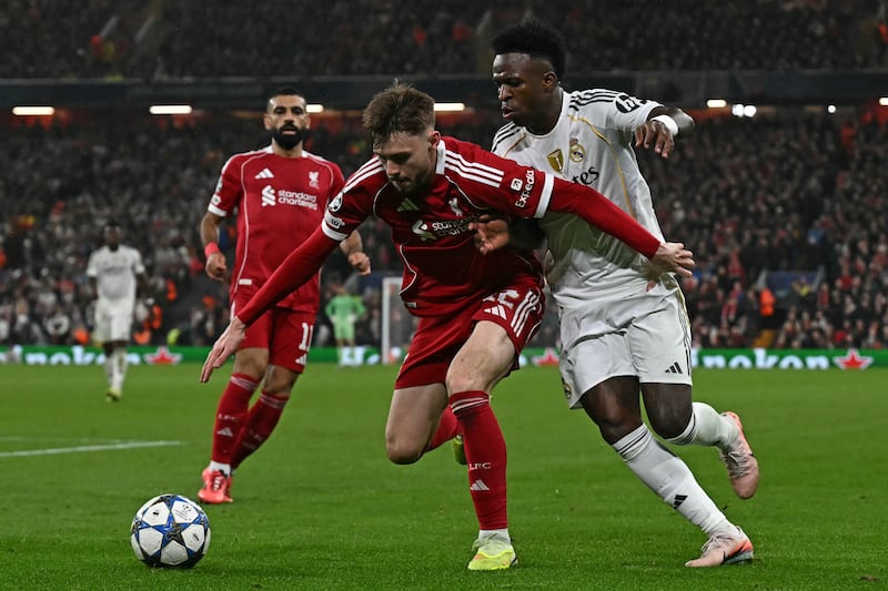 Liverpool's Conor Bradley in action against Real Madrid's Vinicius Junior during Tuesday's Champions League game at Anfield. Photograph: Paul Ellis/AFP via Getty Images