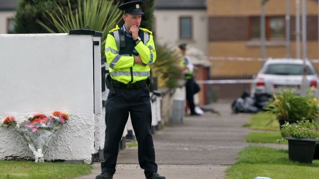 Flowers left near the scene of the double fatal shooting at Balbutcher Drive, Ballymun pictured on Thursday morning. Photograph: Colin Keegan, Collins Dublin