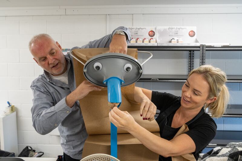 The couple working one of its new leaner packaging machines