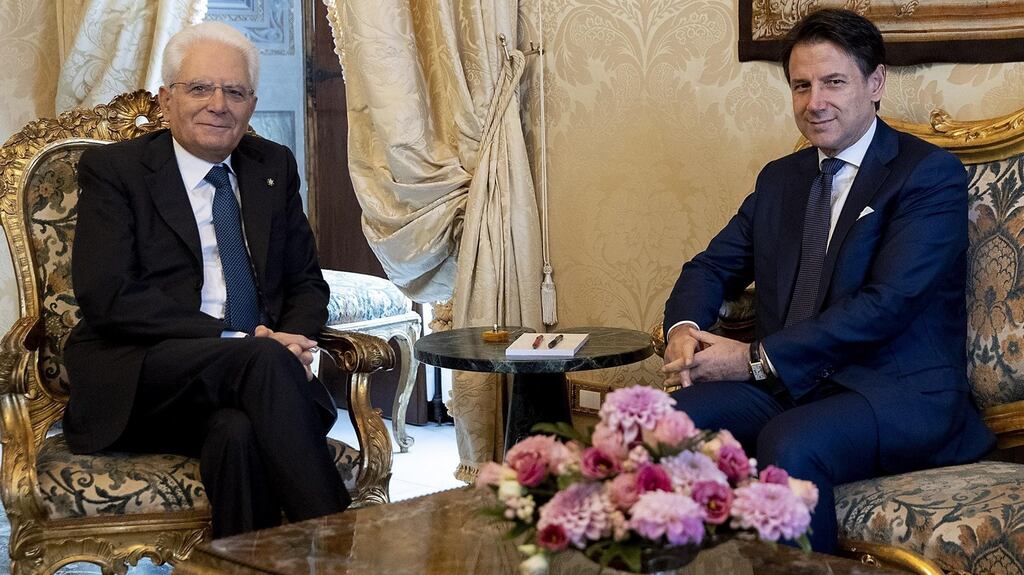 Italian president Sergio Mattarella with prime minister Giuseppe Conte  during their meeting at the Quirinal Palace in Rome on Thursday. Photograph: Paolo Giandotti/EPA