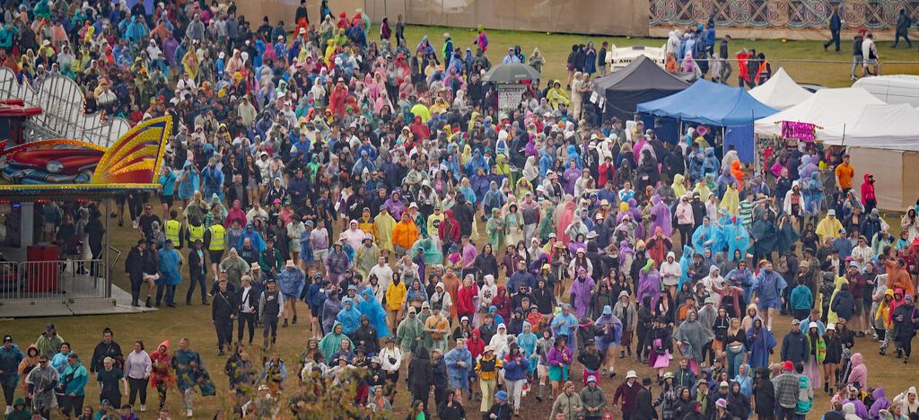 Crowds flock to the 2022 Electric Picnic Festival in Stradbally, Co Laois during a rain shower. Photograph: Niall Carson/PA