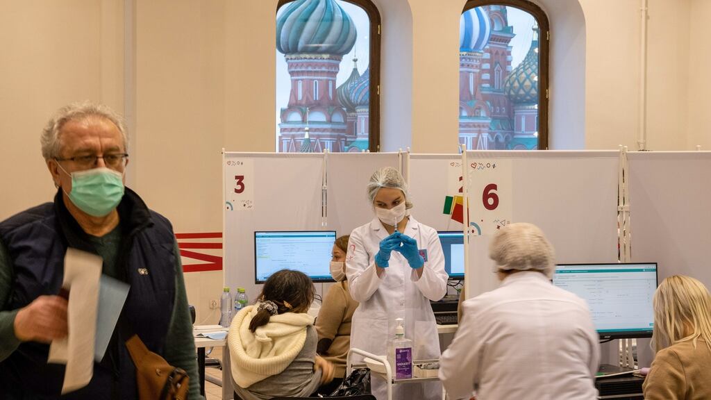 A health worker prepares to administer a dose of the Sputnik V vaccine in Moscow, Russia. Photographer: Andrey Rudakov/Bloomberg