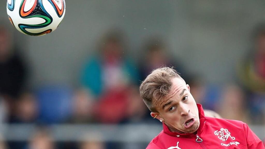 Head the ball: Swiss player Xherdan Shaqiri in action during a training session in Weggis, Switzerland, last month. Photograph: Peter Klaunzer / EPA