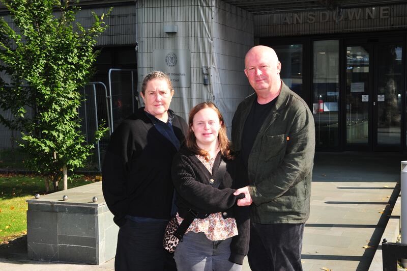 Ellie Dunne, centre, with her parents Katy McGuinness and Felim Dunne at the WRC in Dublin. Photograph: Stephen Bourke