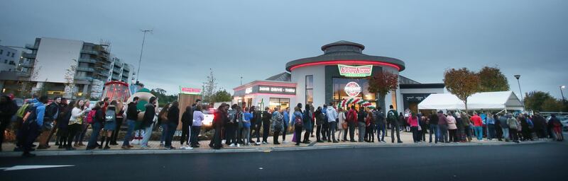 Krispy Kreme: customers queue at the Blanchardstown doughnut store at 6.30am on its first day; it opened at 7am. Photograph: Leon Farrell/Photocall