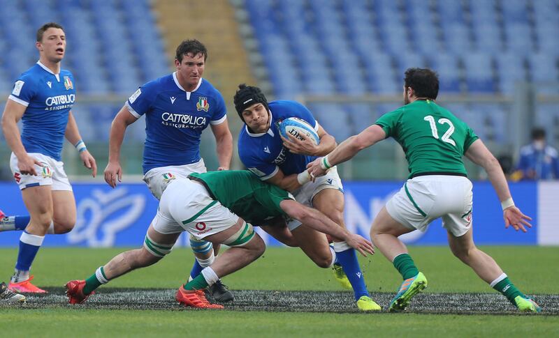 Juan Ignacio Brex of Italy is tackled by Ireland's Will Connors and Robbie Henshaw in the 2021 Six Nations. Photograph: Paolo Bruno/Getty Images