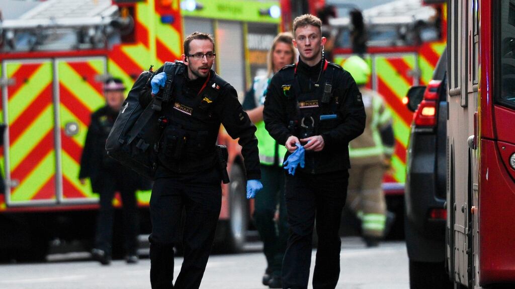 Police and emergency vehicles gather near London Bridge in England,  after what was described as a  terrorist incident in the area. Photograph: Daniel Sorabji/AFP via Getty Images