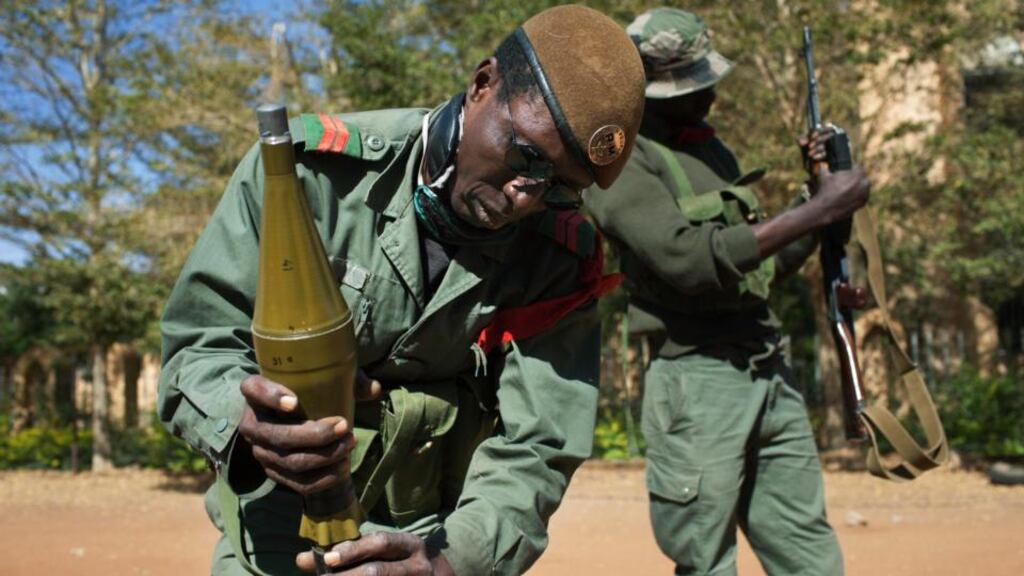 A Malian soldier fixes a rocket during fighting with Islamists in Gao in February. Photograph: Joe Penney/Reuters.