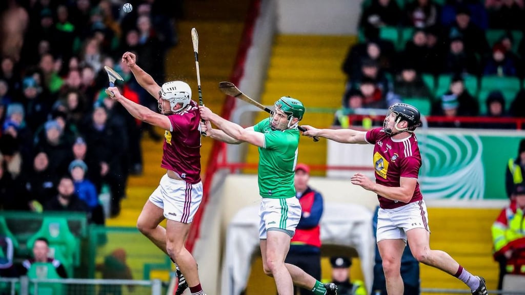 Robbie Greville and Liam Varley of Westmeath battle for possession with Brian Ryan of Limerick during the Allianz Hurling League Division 1A game at the LIT Gaelic Grounds. Photograph: Keith Wiseman/Inpho