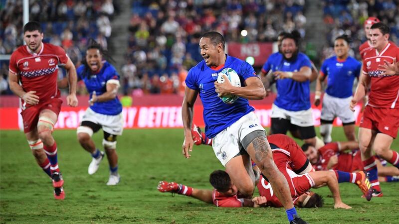 Ed Fidow crosses for Samoa in their win over Russia. Photograph: William West/AFP/Getty