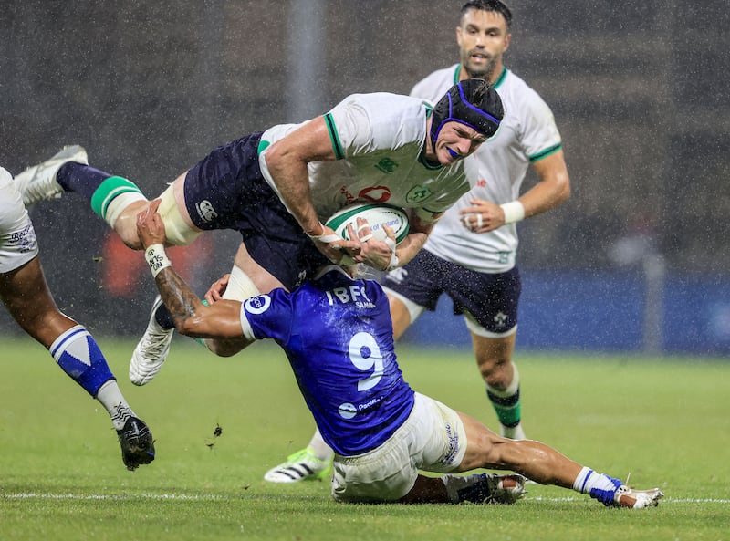 Ireland’s Ryan Baird with Jonathan Taumateine of Samoa. Photograph: Dan Sheridan/Inpho