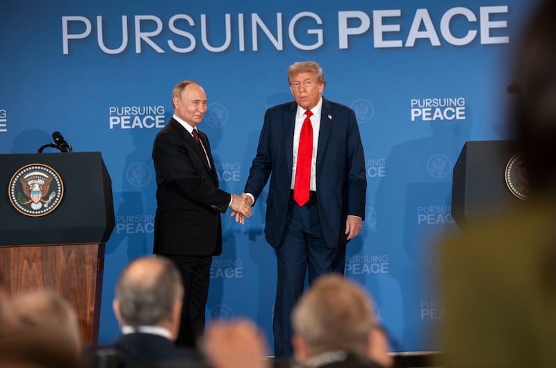 Russian president Vladimir Putin and US president Donald Trump shake hands after a joint news conference following their meeting in Anchorage, Alaska, earlier this year. Photograph: Doug Mills/ The New York Times