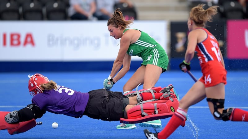 Ireland’s Deirdre Duke scores past USA goalkeeper Jackie Briggs during the Women’s World Cup Pool B game at Lee Valley Stadium in London. Photograph: Joe Toth/Inpho