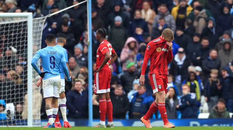Fulham’s Tim Ream was sent off during his side’s defeat to Man City. Photograph: Mike Egerton/PA