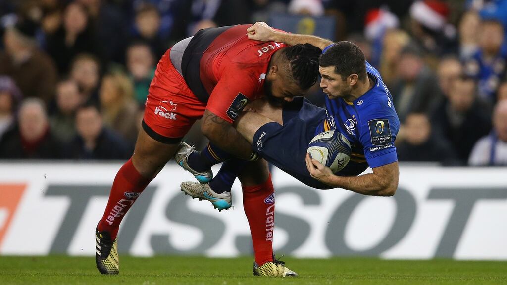 Rob Kearney is tackled by Mathieu Bastareaud during Leinster’s Champions Cup match against Toulon at the Aviva Stadium. Photograph: Billy Stickland/Inpho