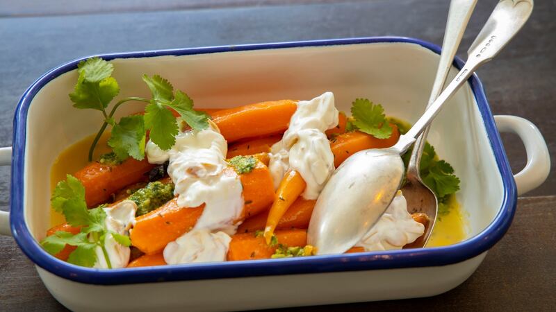Glazed carrots with coriander and roasted almond yoghurt. Photograph: Patrick Browne