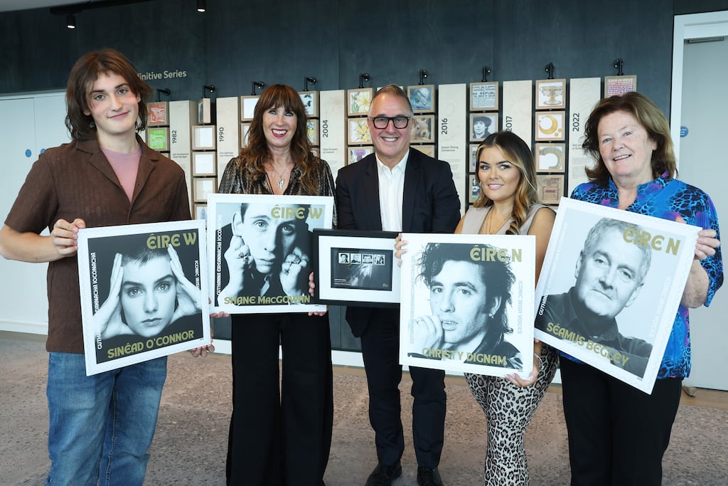 Commemorative stamps: (from left) Yeshua Bonadio, son of Sinéad O’Connor; Victoria Mary Clarke, wife of Shane MacGowan; David McRedmond, chief executive of An Post; Kiera Dignam, daughter of Christy Dignam; and Máire Uí Bheaglaoich, wife of Séamus Begley