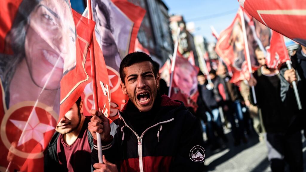People protest at the Istanbul funeral of Aziz Guler, a Turkish Kurd killed in September after stepping on a mine in Syria. Photograph: Ozan Kose