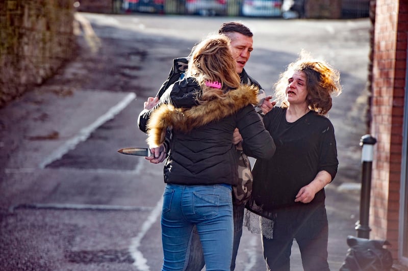 News 1st – A knife is drawn during an altercation outside a protected women’s housing scheme. Photograph: Michael Mac Sweeney/Provision