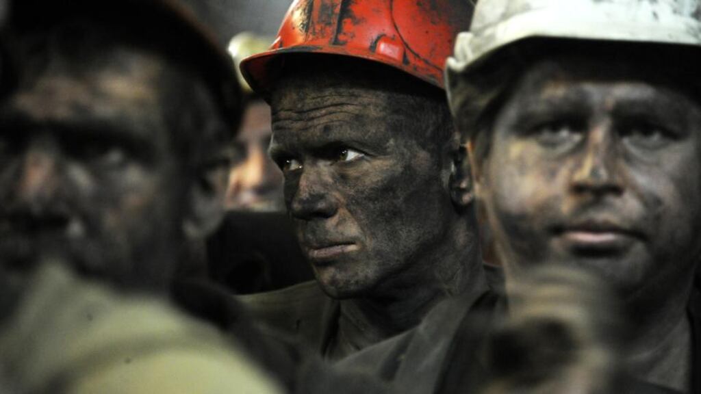 Coal miners leaving a Donetsk mine in June following a shift. Work has ceased in the Donbas coalmining region due to the militants’ struggle against Kiev authorities. Photograph: Viktor Drachev/Getty Images