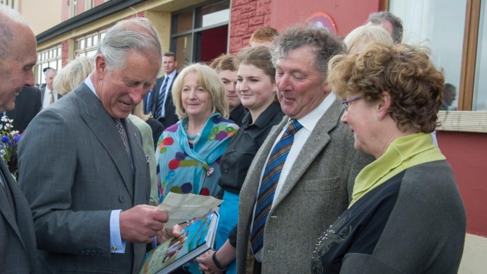 Prince Charles reads a letter from Lord Mountbatten shown to him by Daithi O’Dowd as he meets members of the local community Co Sligo. Photograph: Arthur Edwards/WPA Pool/Getty Images