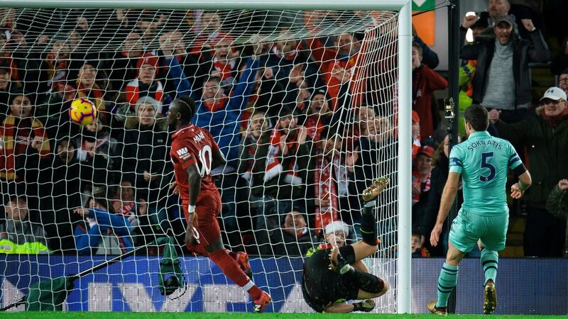 Mane puts Liverpool 3-1 ahead. Photo: Peter Powell/Getty Images