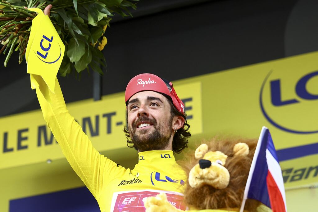 Irish cyclist Ben Healy of EF Education-EasyPost celebrates on the podium in the yellow jersey of leader in the overall ranking after stage 10 of the 2025 Tour de France. Photograph: David Pintens/Belga Mag/AFP via Getty Images