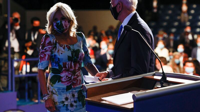Democratic presidential nominee Joe Biden joined onstage by his wife Dr Jill Biden. Photograph: Jim Bourg/Pool/Getty Images