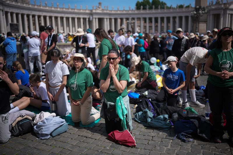 Youth groups and people attend the Holy Mass on Divine Mercy in St Peter's Square. Photograph: Christopher Furlong/Getty Images