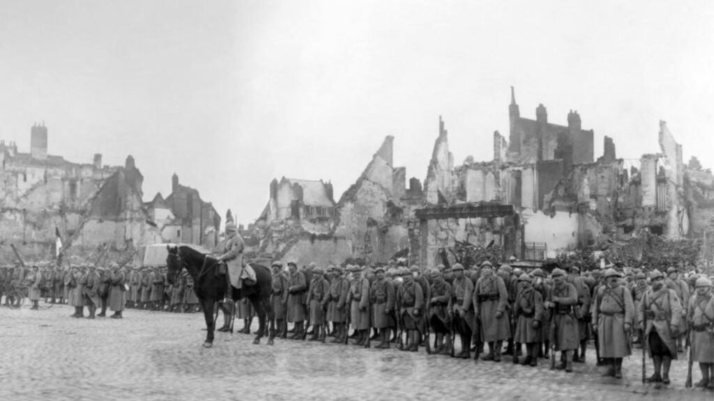 A regiment of French marine fusiliers arriving in the ruined square in Cambrai, France, in 1914, after the outbreak of the first World War. As late as July 25th that year Le Petit Parisien newspaper hoped that war could be avoided. Photograph: PA