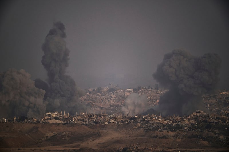 Smoke rises into the sky following an Israeli air strike in the northern Gaza Strip (Leo Correa/AP/PA)