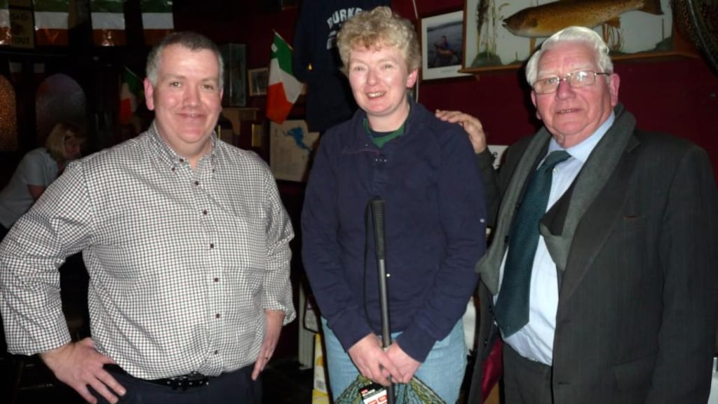 Tomás Burke (left) with top lady angler Stella McGriskin, Kiltyclogher, Co Leitrim, accepting her prize in Burke’s of Clonbur, Co Galway.
