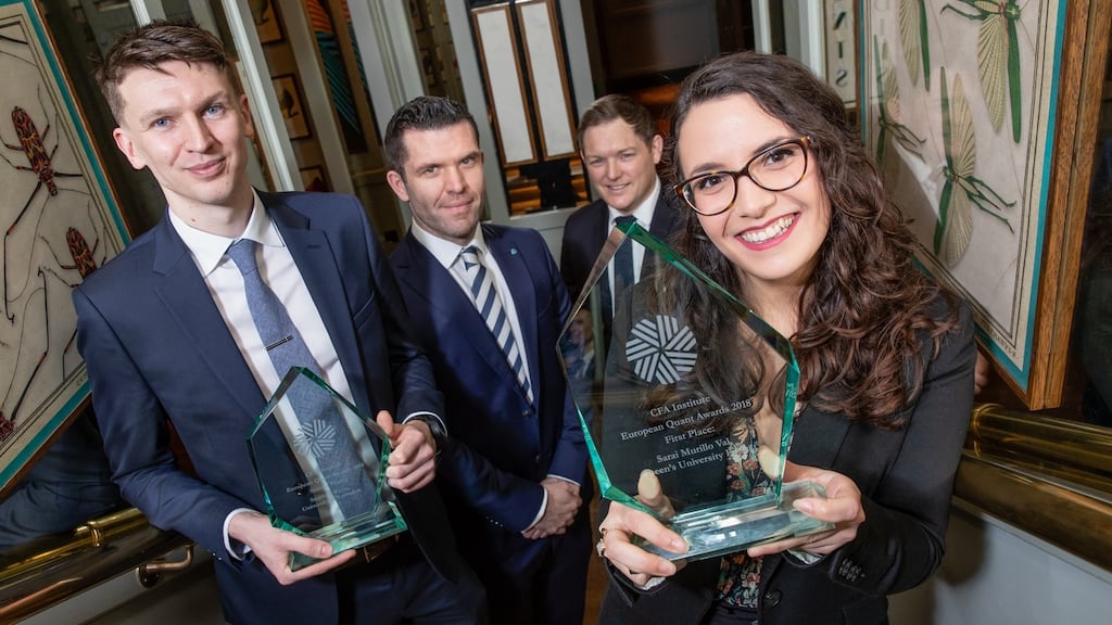 Stephen White, who won second prize; CFA Society Ireland president Noel Friel; Eoin Diffley of Irish Life Investment Managers; and Sarai Murillo Val, who won first prize in the competition